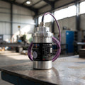 Close-up of NS100 anti-sway sensor highlighting two-axis measurement in a professional industrial setting.
